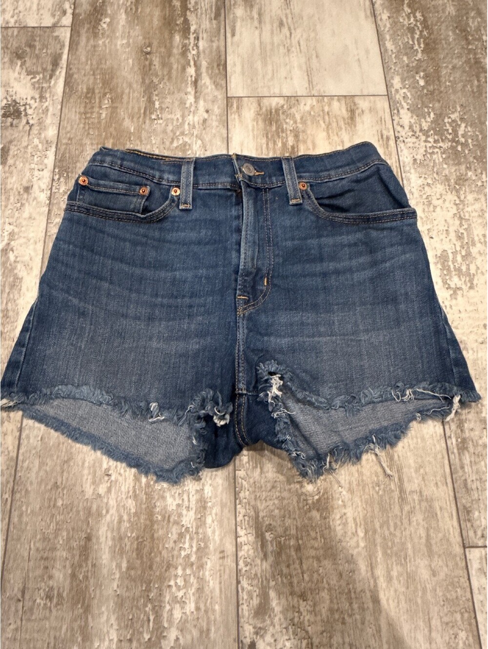 Levi's 27 High Rise Denim Shorts Distressed Raw Hem